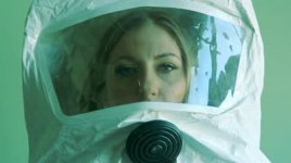 stock-footage-young-woman-wearing-environmental-safety-suit.jpg