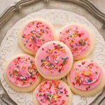 Soft-Lofthouse-Style-Frosted-Sugar-Cookies-are-the-perfect-sweet-treat-with-a-tall-glass-of-milk.jpg
