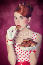 30600268-beautiful-redhead-women-with-coockie.jpg