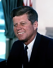 220px-John_F._Kennedy%2C_White_House_color_photo_portrait.jpg